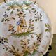 Antique Moustiers plate hand-decorated with a horseman.