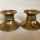 Pair of rat cave candlesticks with tulip base in bronze.