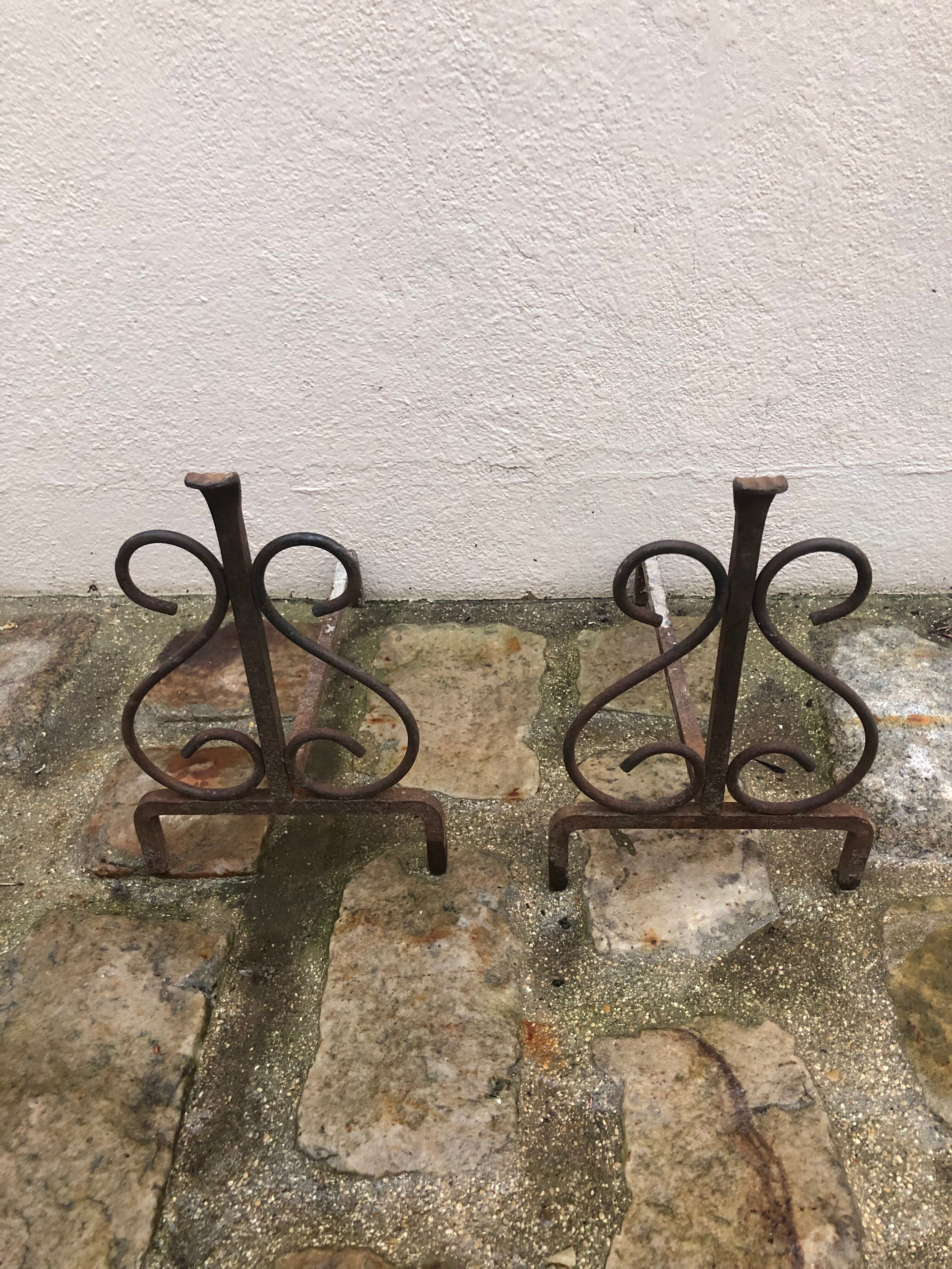 Pair of wrought iron pegs