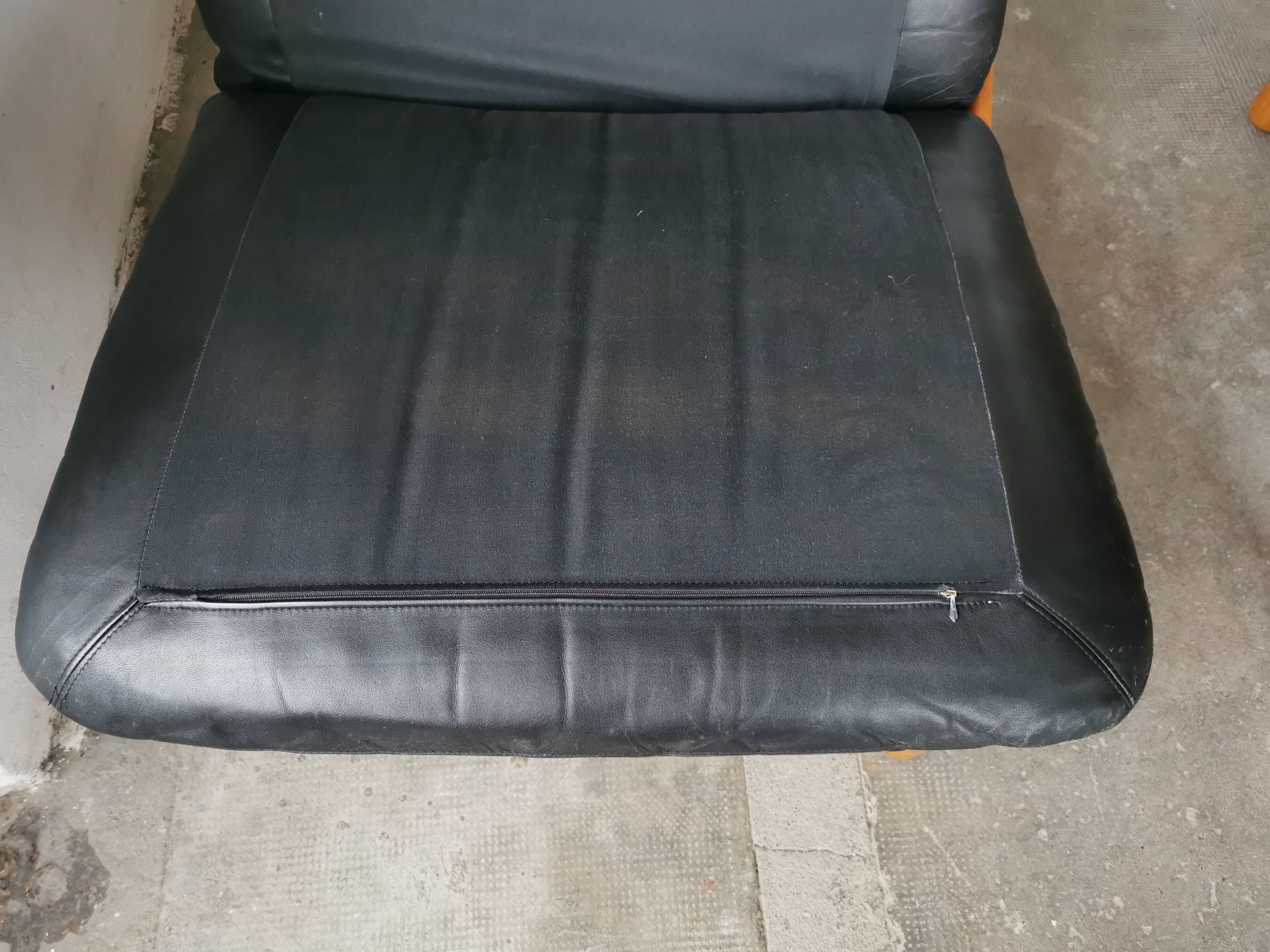 Pair of designer leather armchairs 80s