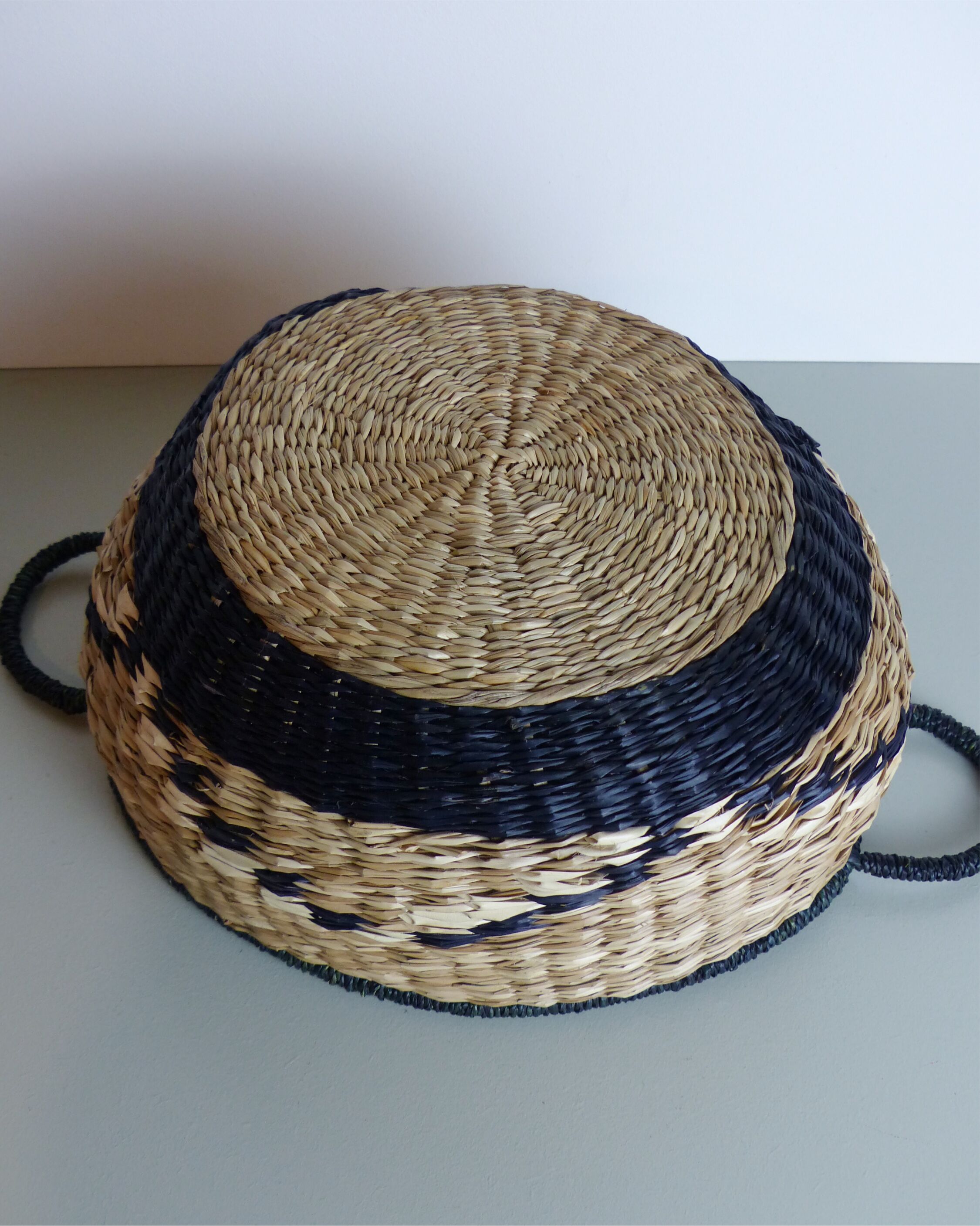 Vintage basket in black and beige raffia