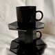 Set of 2 arcoroc black glass coffee cups with underplates