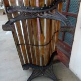 Small garden bench, with cast iron legs.