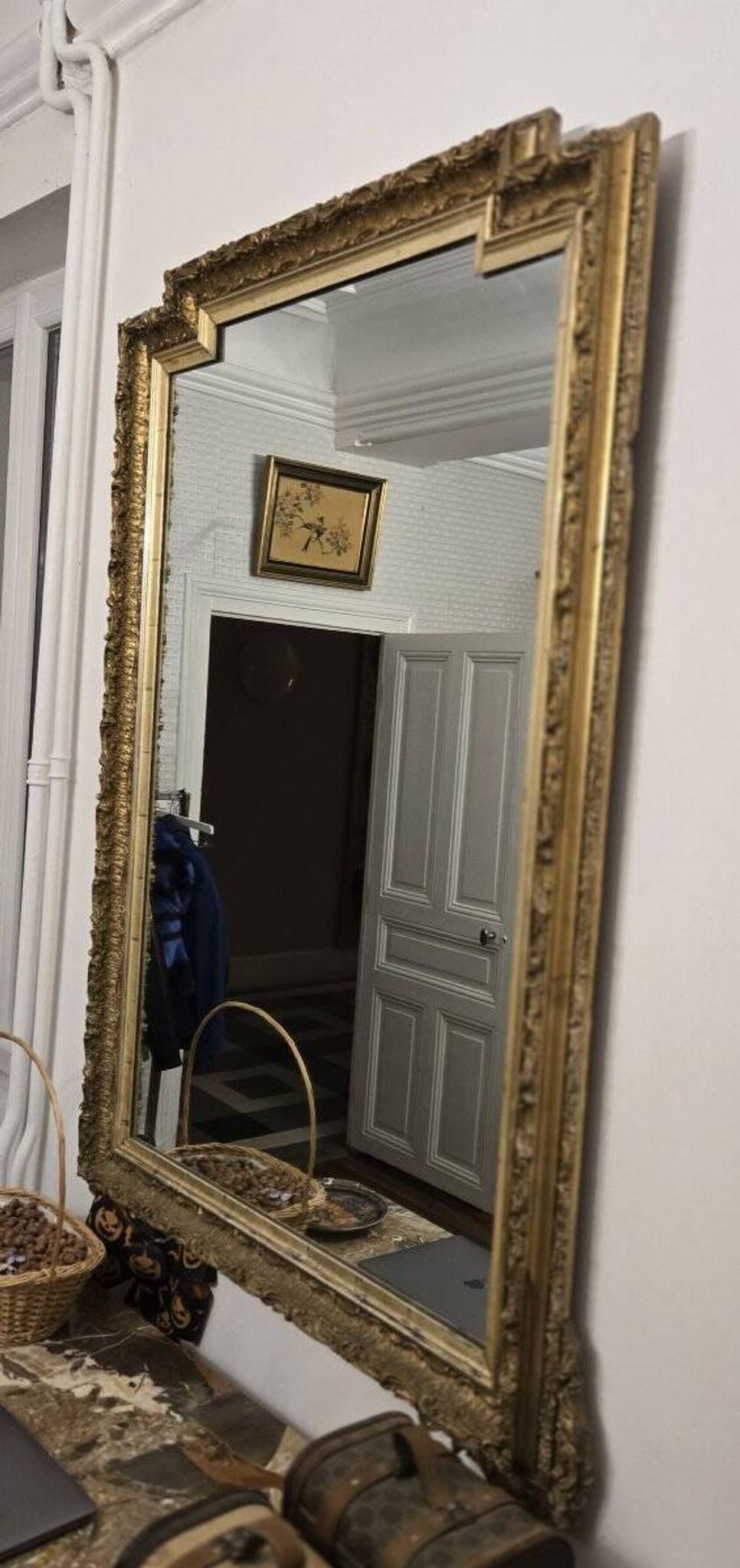 Large antique mirror from the Napoléon III era, finely carved and gilded with gold leaf.