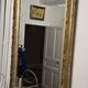 Large antique mirror from the Napoléon III era, finely carved and gilded with gold leaf.