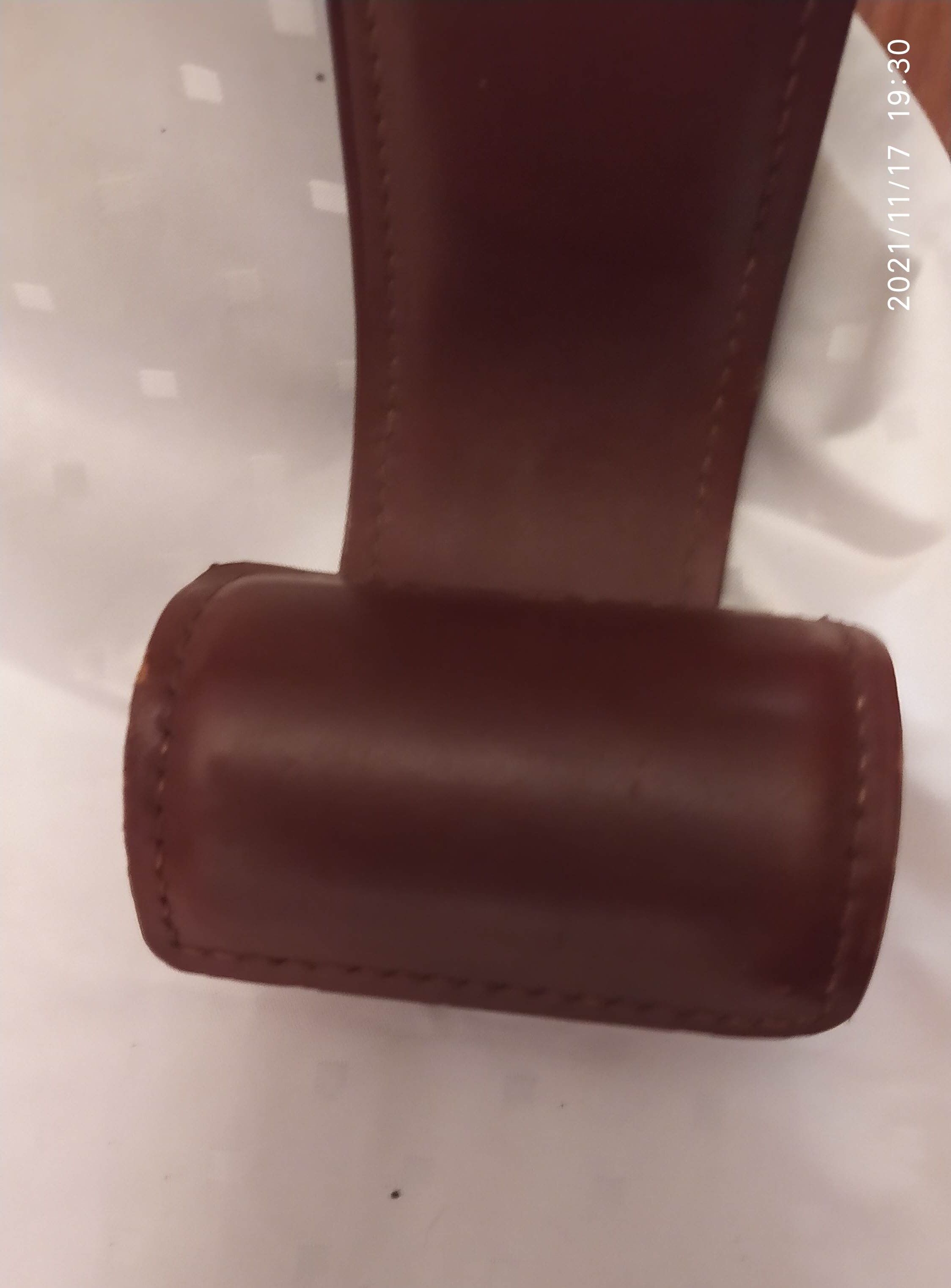 Leather wall coat rack