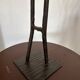 Vintage wrought iron anthropomorphic candle holder