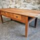 Old French rustic coffee table in cherry wood.