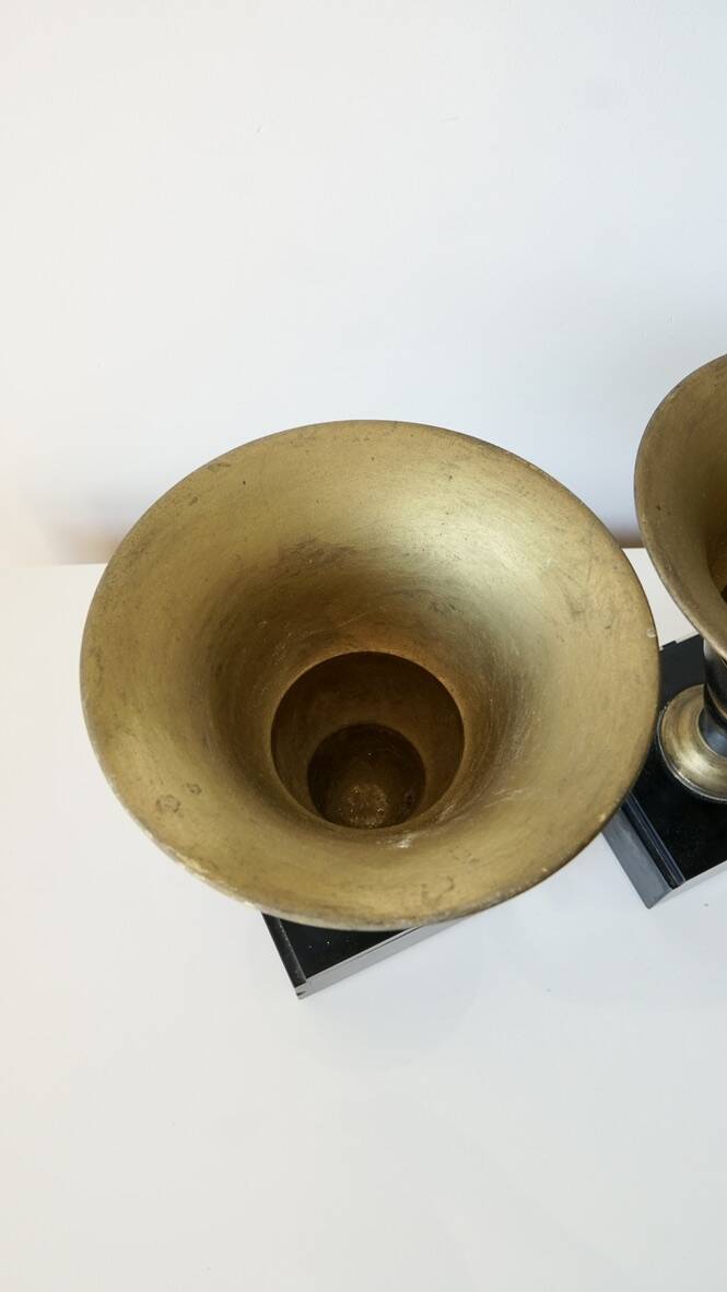 Pair of Art Deco enamelled brass casseroles, black and white marble base