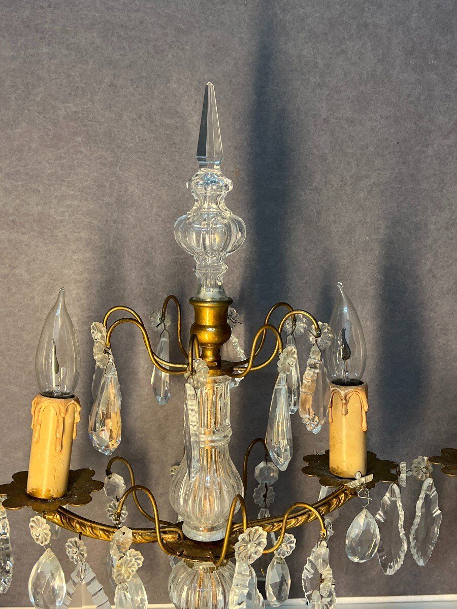 Pair of antique chandeliers, in brass with cut glass pendants, early 20th century