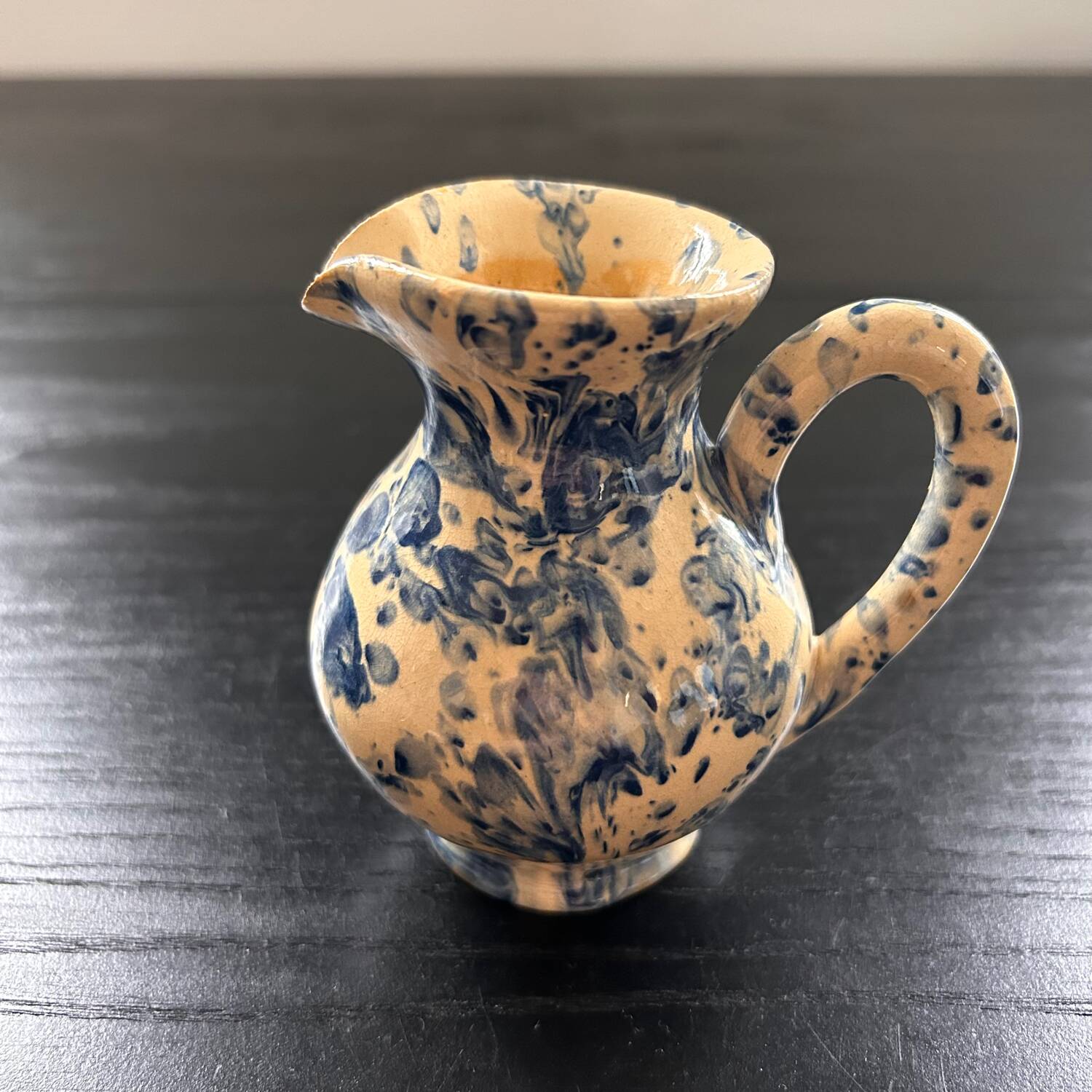 Small blue and beige mixed pitcher