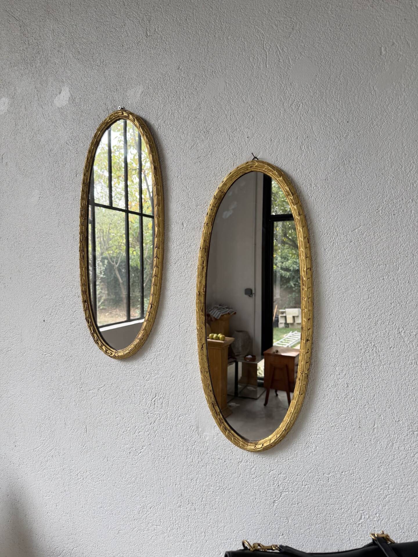 Pair of oval mirrors 1900 gilded stucco