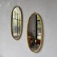 Pair of oval mirrors 1900 gilded stucco