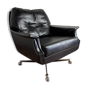Fauteuil vintage édité par Möbel Mann – noir élégant