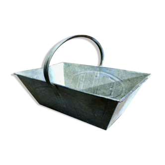 Old grape pickers' basket in galvanized zinc