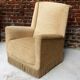 Fauteuil en velour beige et franges