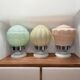 Set of three Thabur globe wall lights in pastel opaline