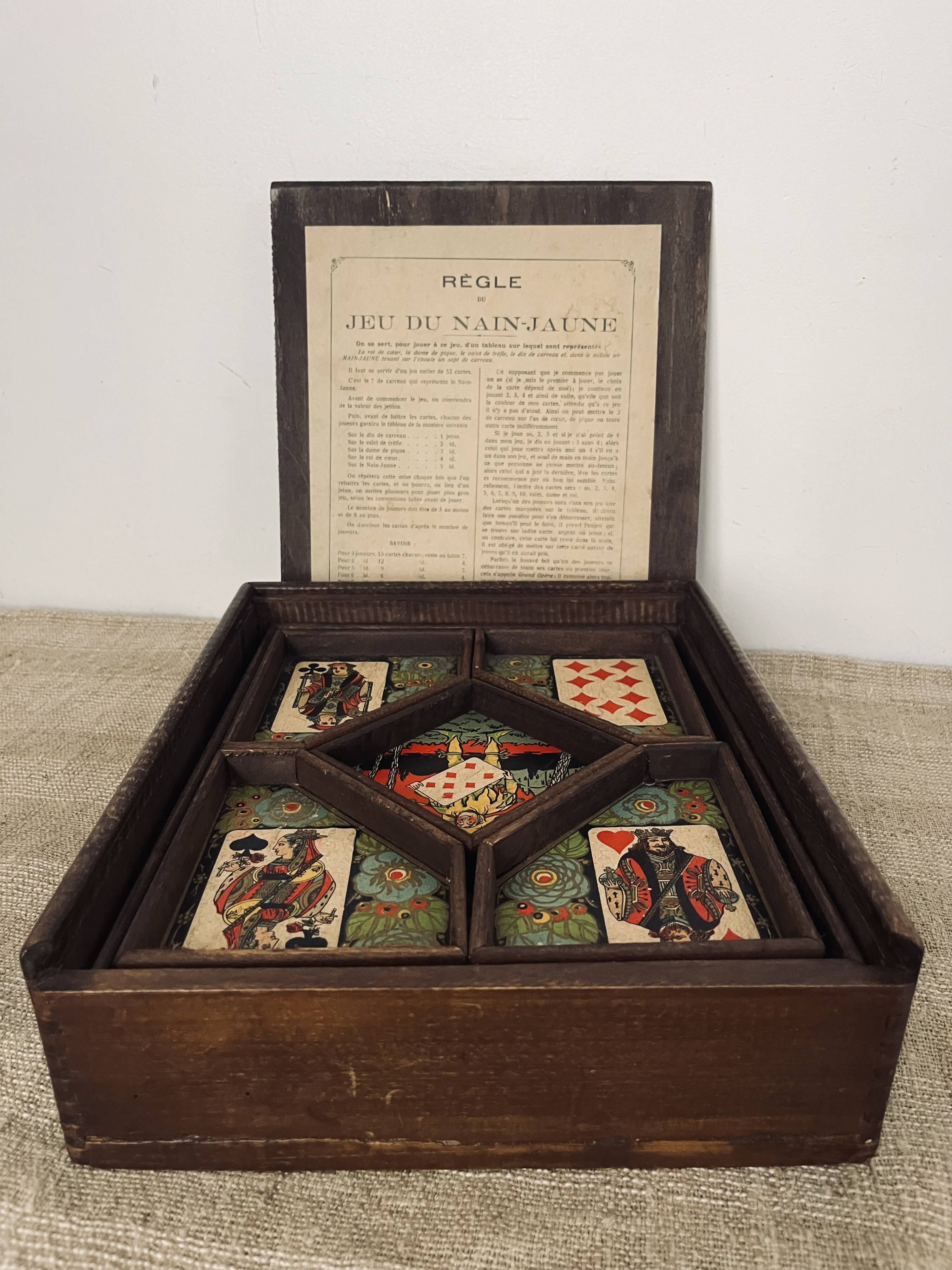 Old game of nain jaune with its bone tokens.