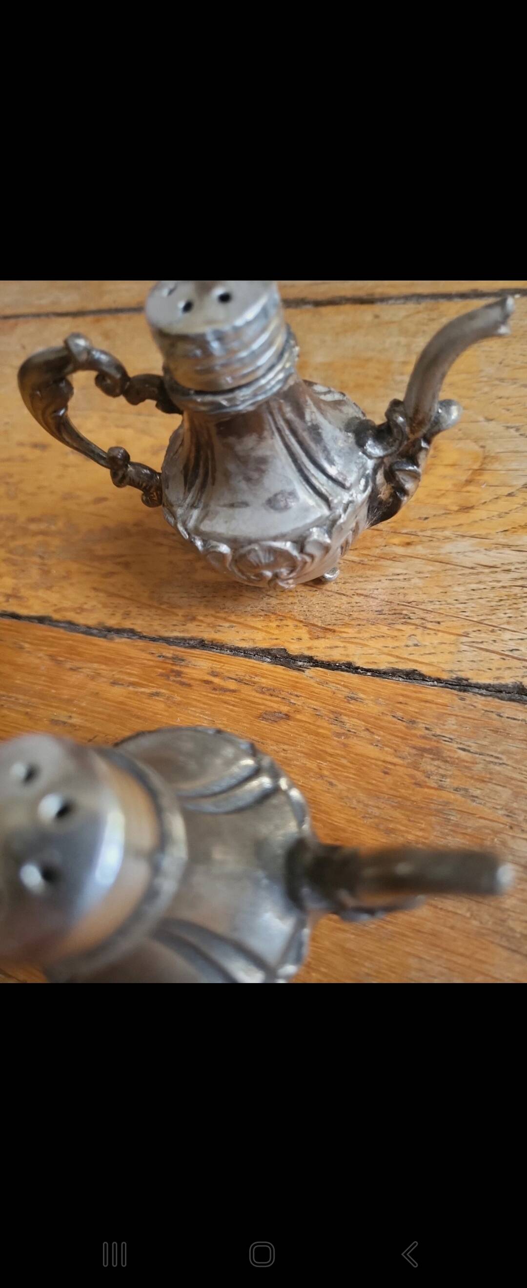 Antique miniature salt and pepper shakers