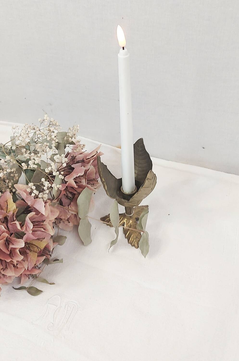 Brass flower candle holder