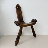 Brutalist hand carved oak Spanish tripod chair , 1970s