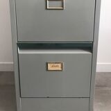 Three-drawer industrial grey metal filing cabinet with hanging backs