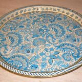 Blue cashmere round tray on white background.