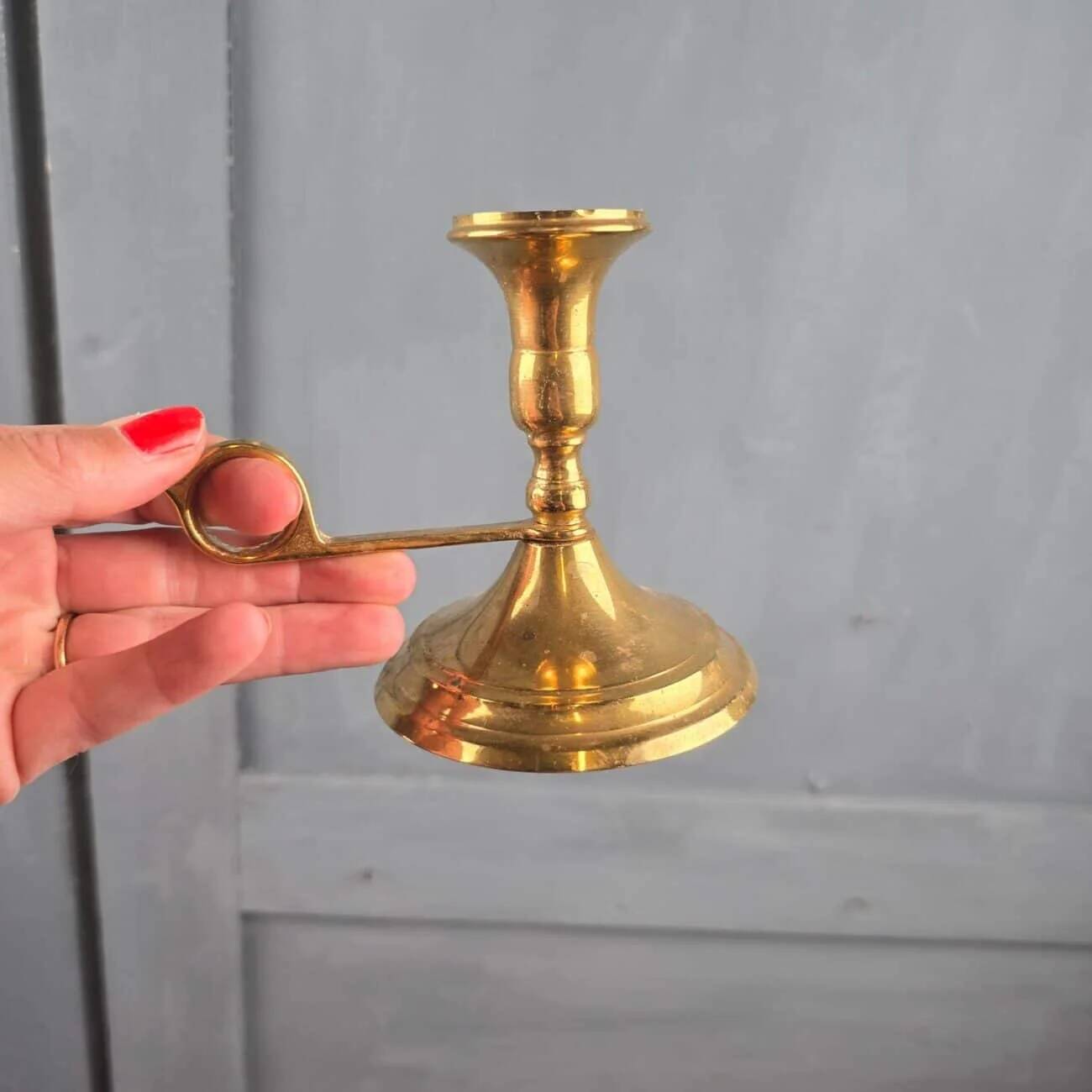 Vintage brass little cellar rat, candle holder with a lovely handle.