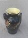 Vintage hand-painted yellow and black glazed ceramic amphora vase