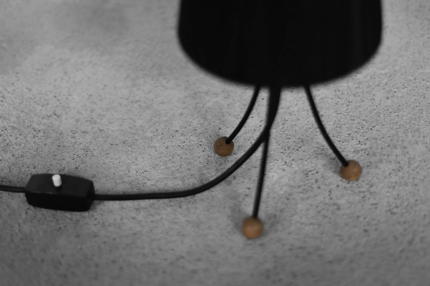 Small modern Polish table lamp from the mid-century with a black shade, 1960s.