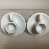 Pair of small white cellar rat candlesticks