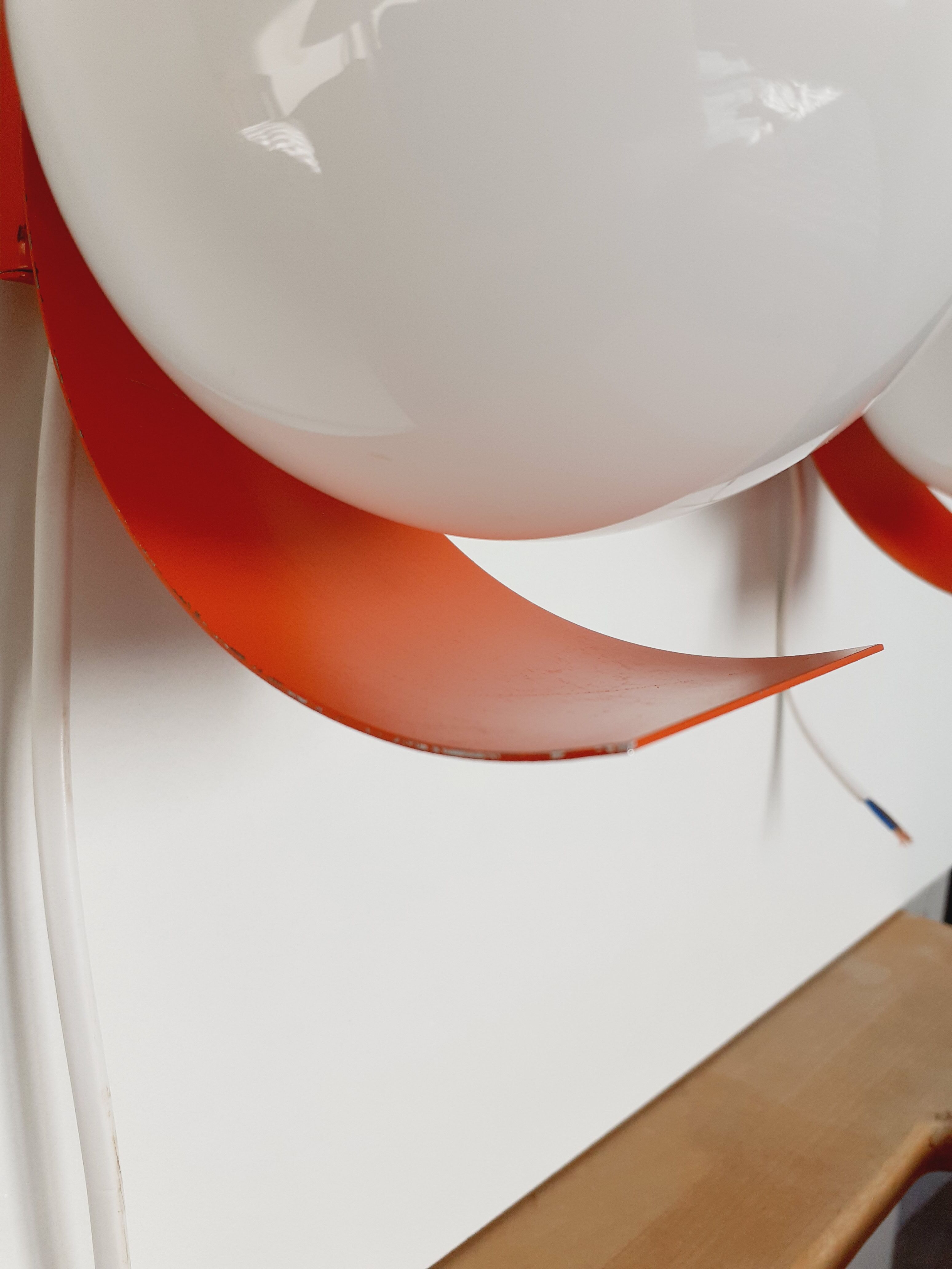 Pair of orange space age wall lamps