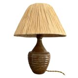 Sandstone lamp and raffia