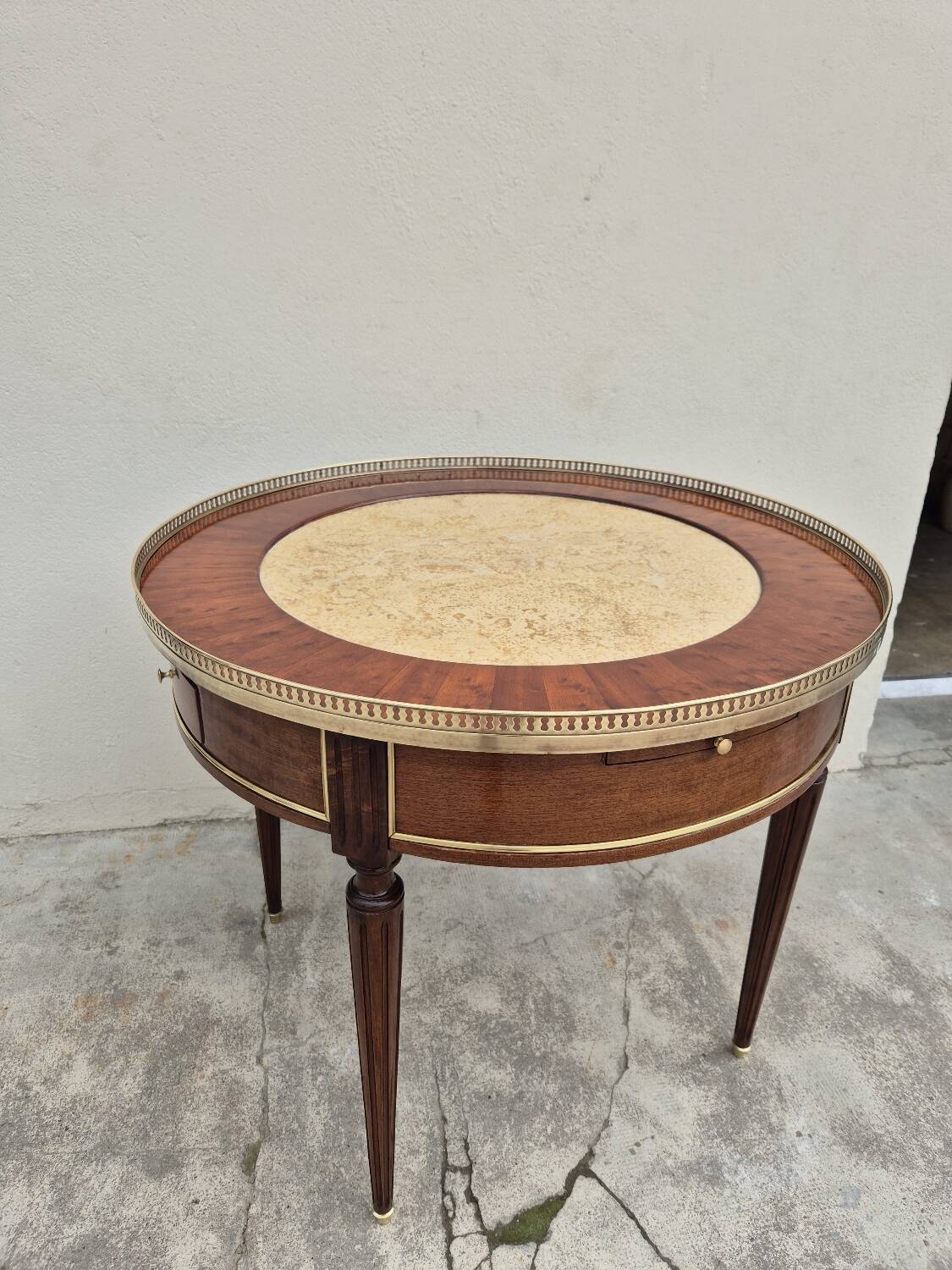 Louis XVI style mahogany bouillotte table in marquetry and bronze