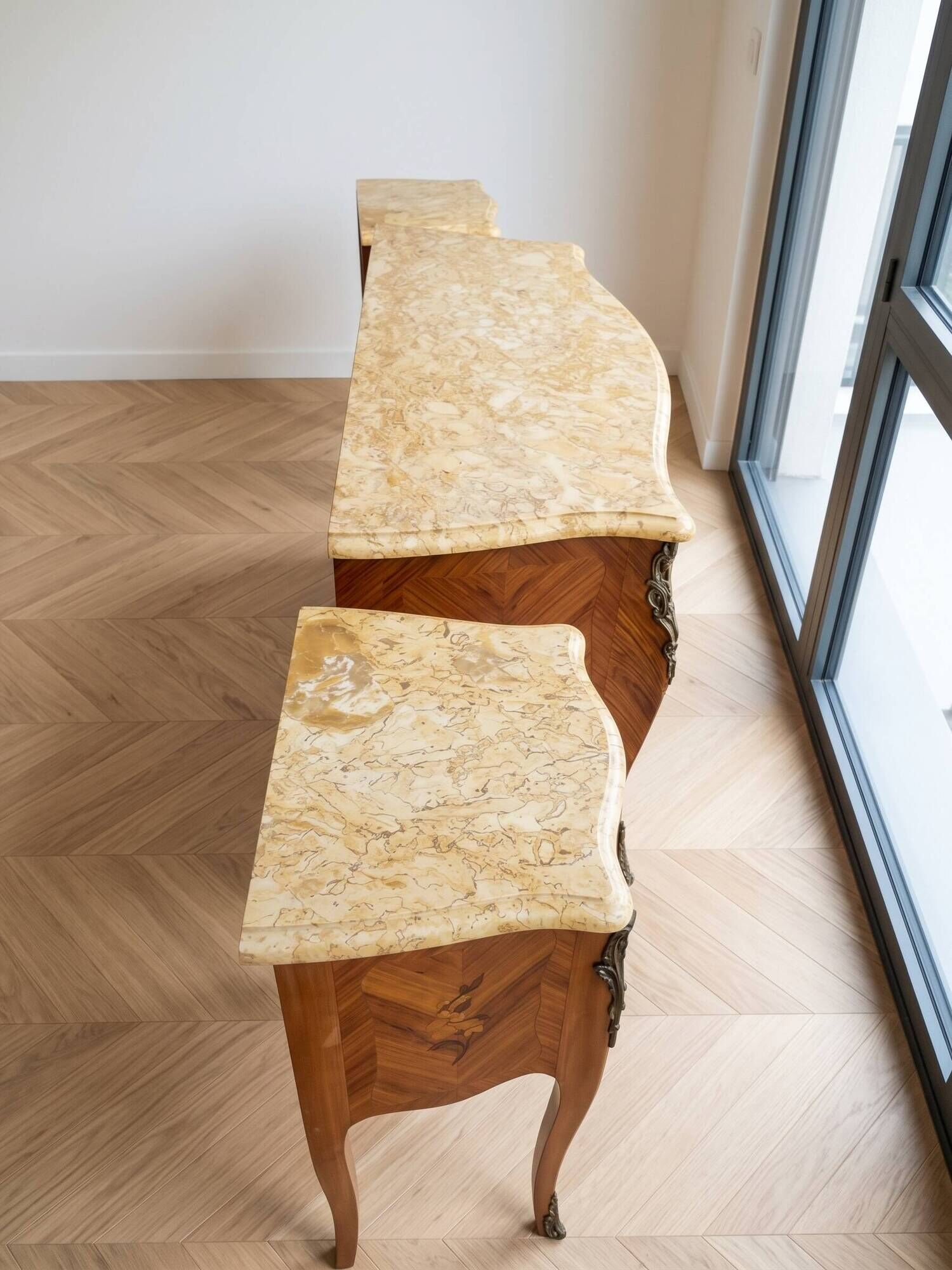 Louis XV bedside table set with marquetry and marble.