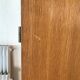 Scandinavian-style wooden cabinet with mirror