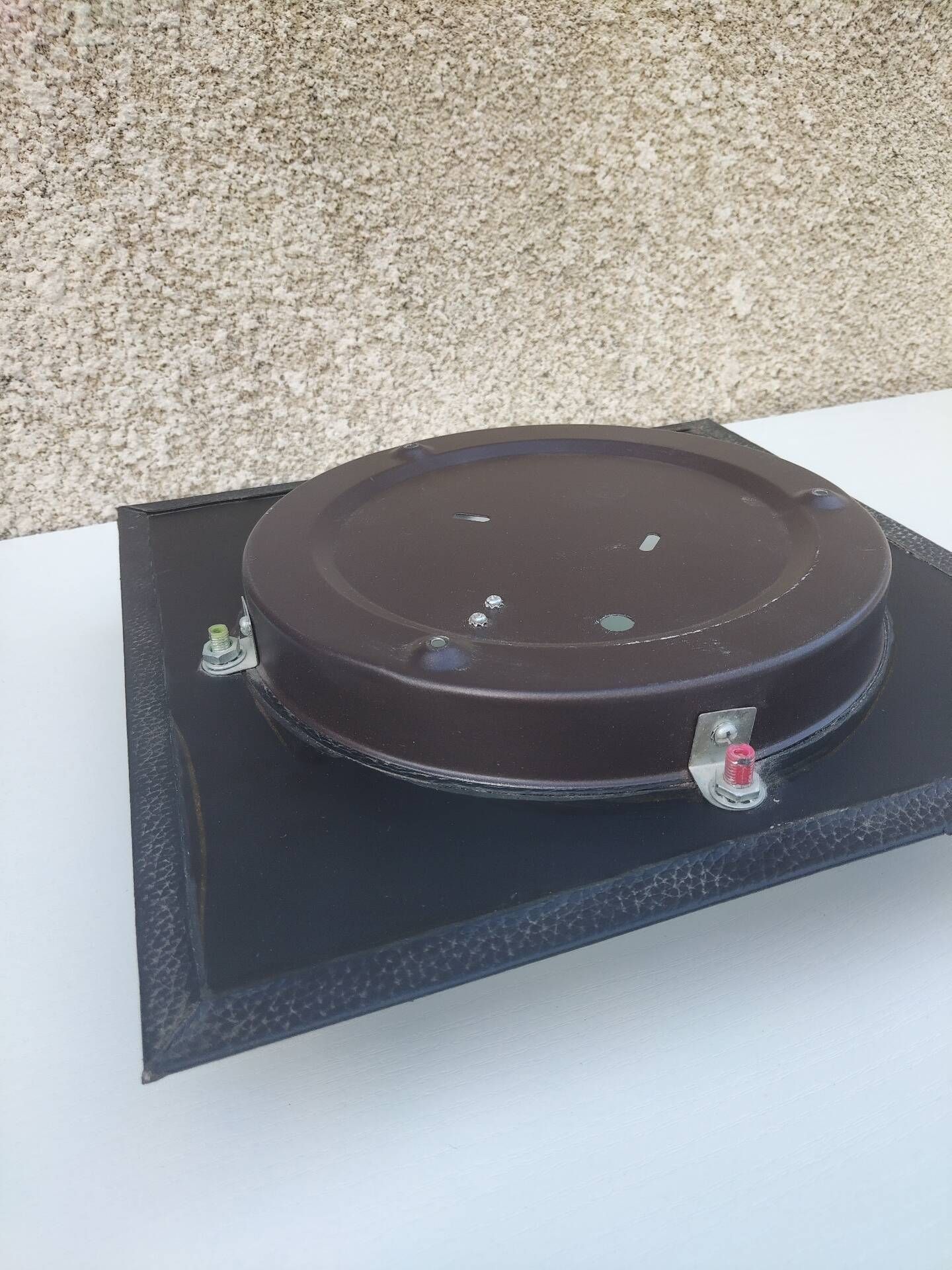 Wall light or ceiling light in frosted glass and leather-like material.