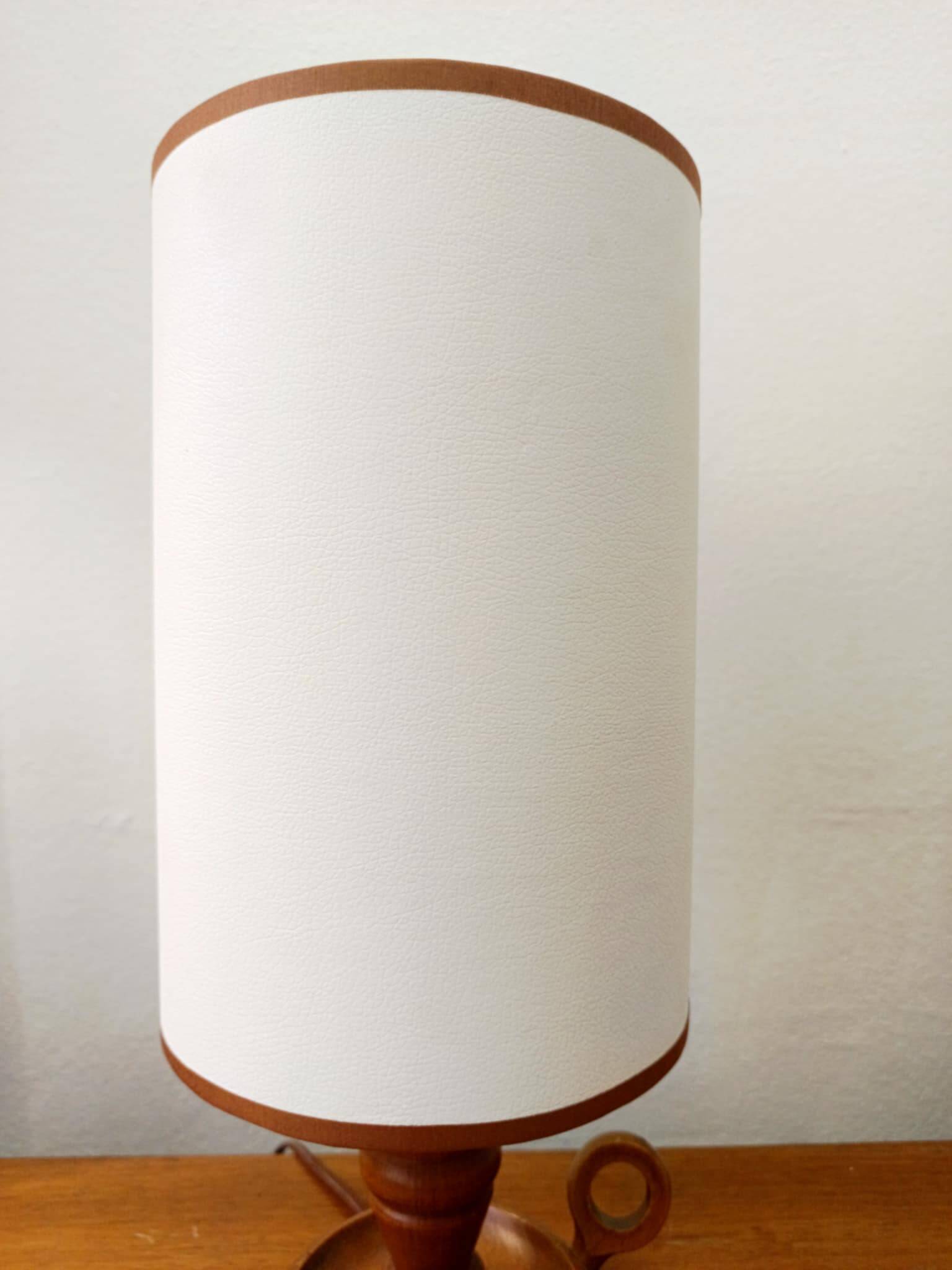 Vintage wooden lamp with white faux leather shade