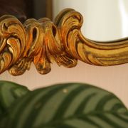 Louis XV style rocaille mirror, handcrafted in gilded wood, 20th century, 80x65 cm.