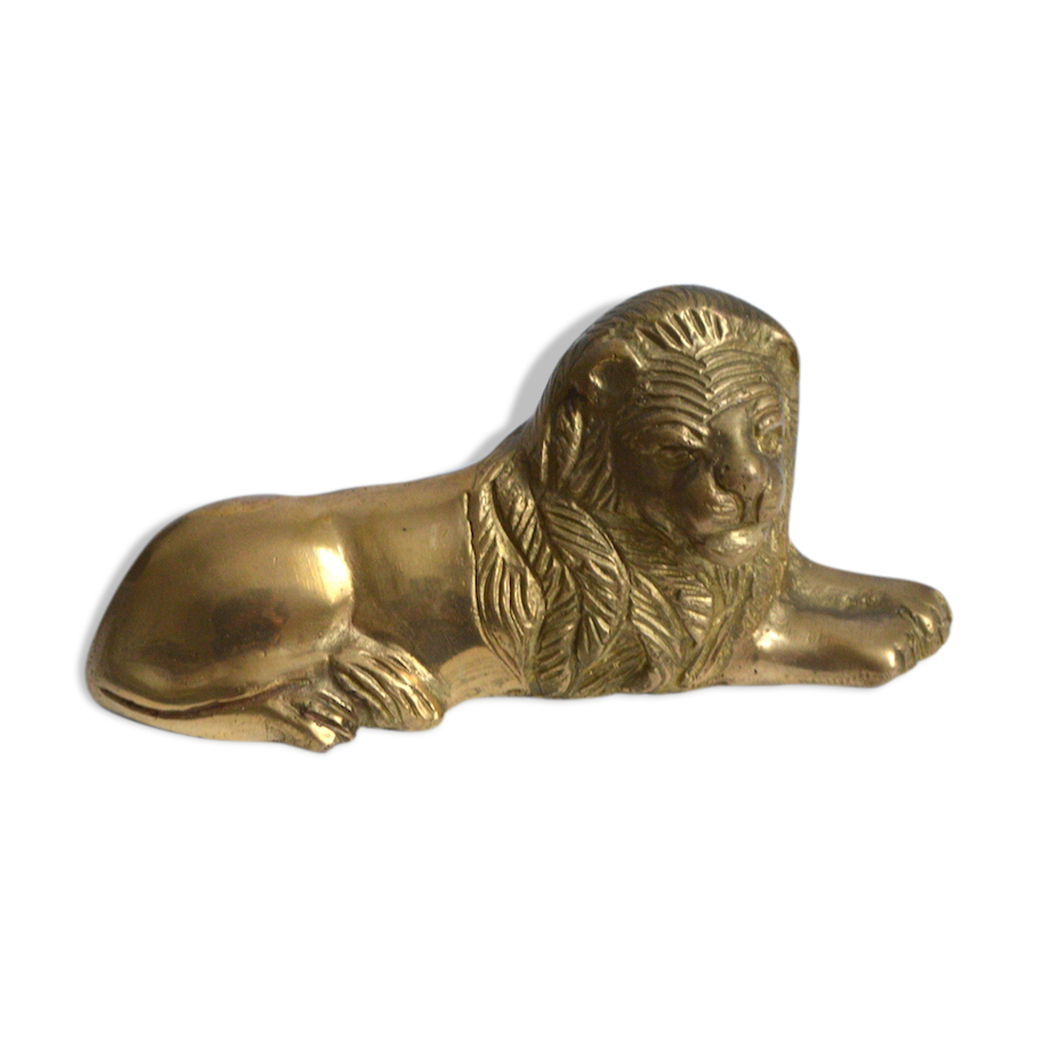 Brass lion paperweight