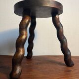 Round wooden tripod stool