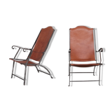 Pair of mid-century leather and metal folding armchairs