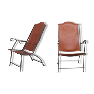 Pair of mid-century leather and metal folding armchairs