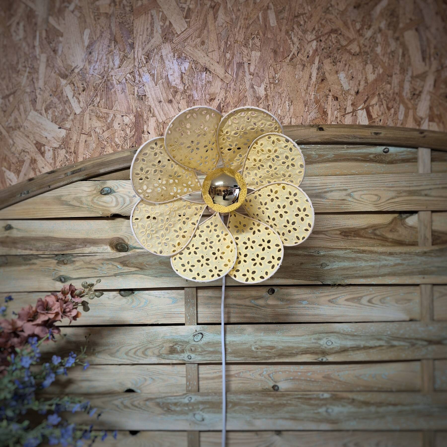 Wall sconce with flower, rattan petals and pastel yellow eyelet embroidery