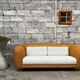 Canapé vintage en rotin design 1970 tissu bouclette écru