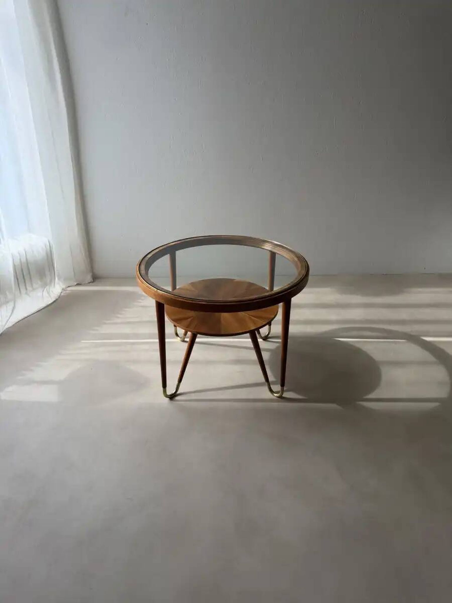 Round walnut coffee table with glass by Ilse Möbel