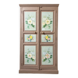 Large antique wardrobe painted with floral decoration.