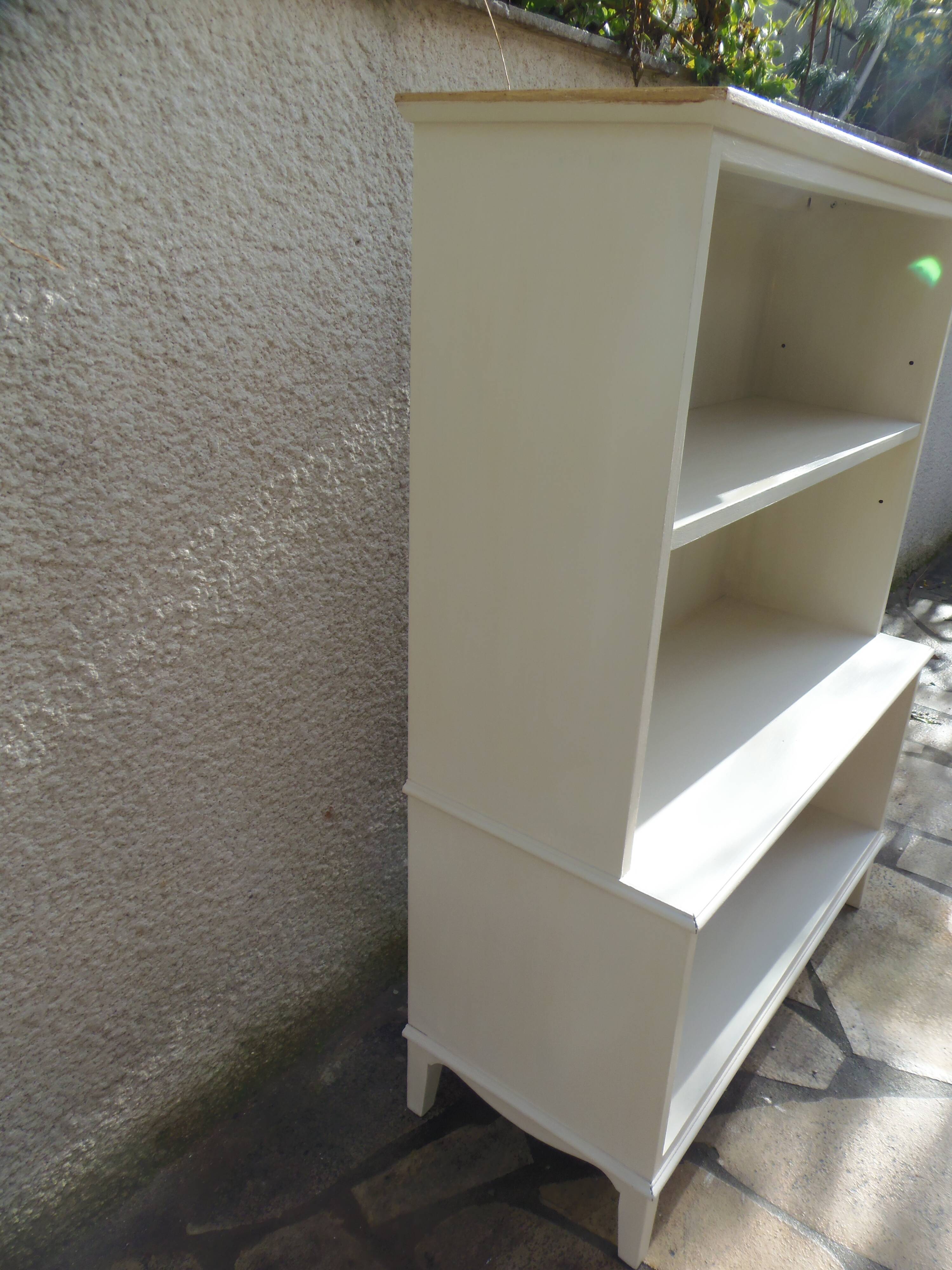 Vintage library enhanced in beige, wooden top.