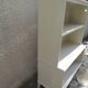 Vintage library enhanced in beige, wooden top.