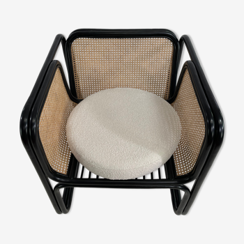 Chaise en rotin laqué noir et cannage